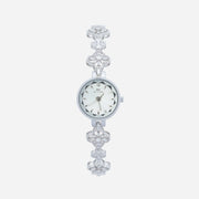 Reloj Floral Dalia plateado con esfera redonda sobre fondo claro