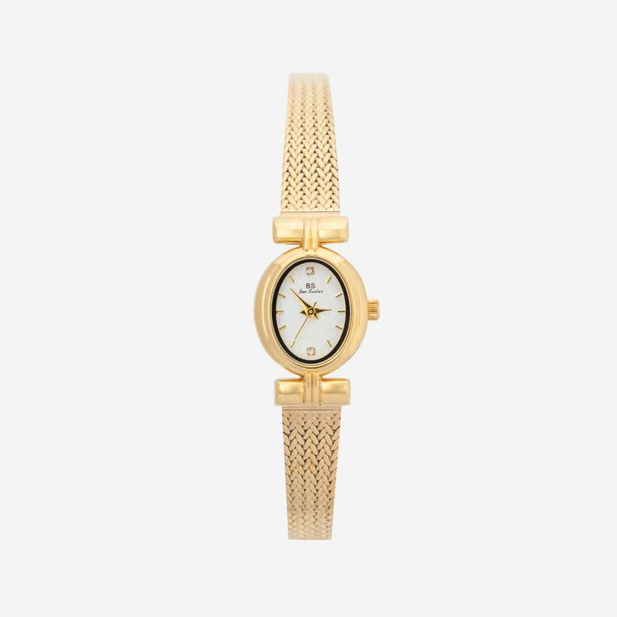 Reloj Ovalado Aurelia dorado con esfera blanca sobre fondo claro