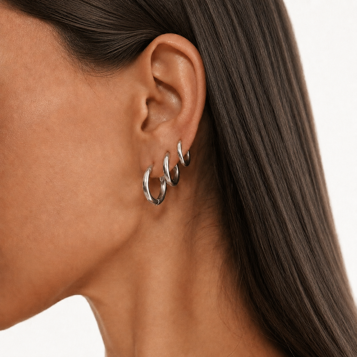 Set Aros Esenciales plateado combinado en la oreja