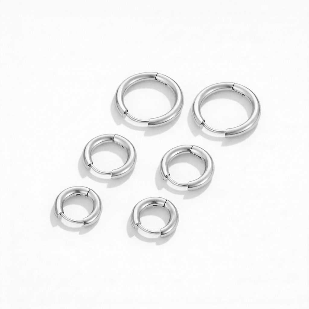 Set Aros Esenciales plateado con tres pares de diferentes tamaños