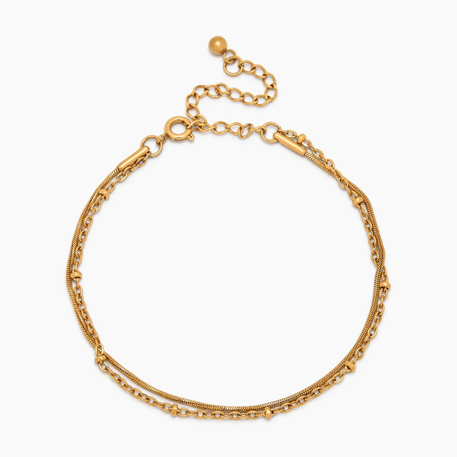 Pulsera Doble Cadena Selene dorada sobre fondo blanco