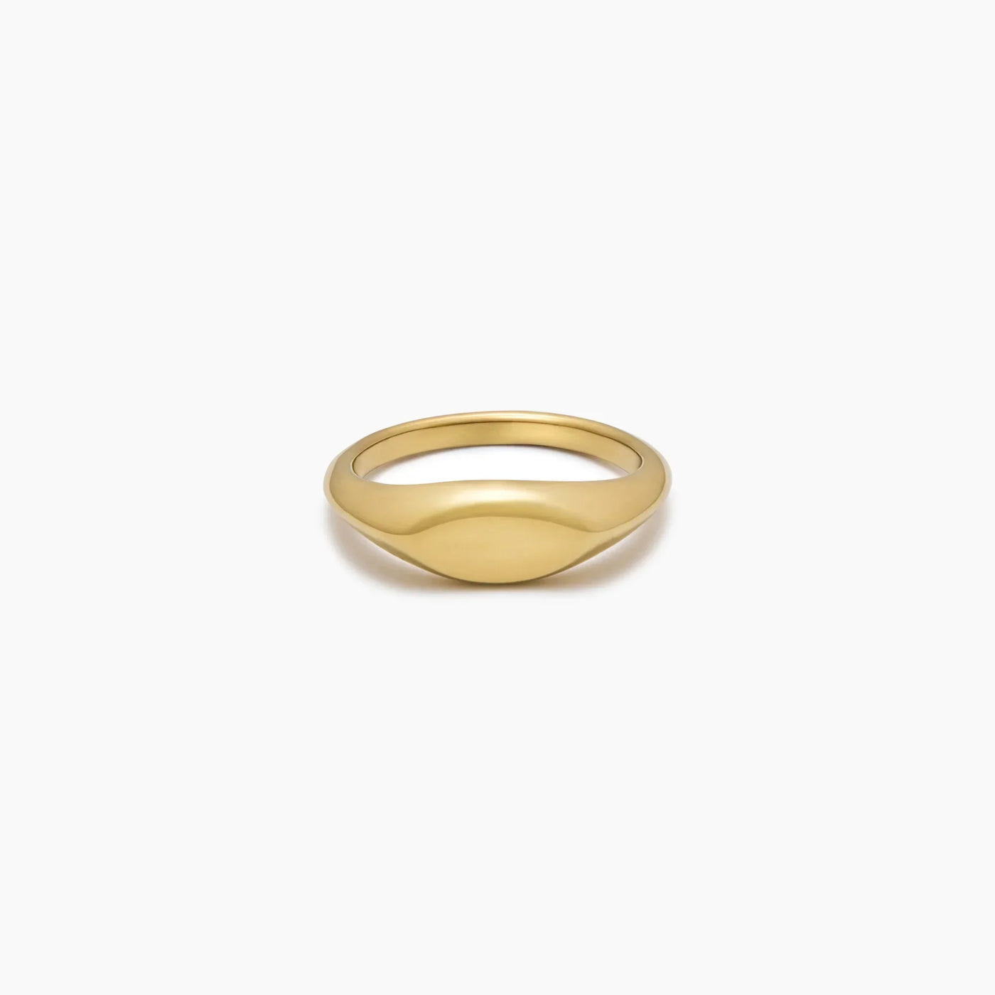 Anillo Sello Alma dorado sobre fondo blanco con un reflejo suave